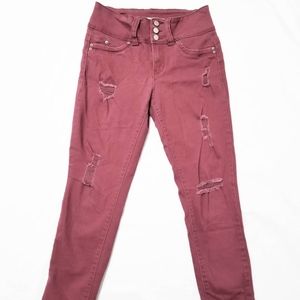 Distressed Mid Rise Skinny Jeans